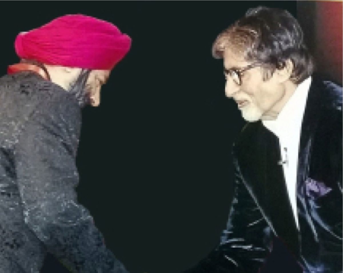 Harjeet being felicitated by Amitabh Bachchan