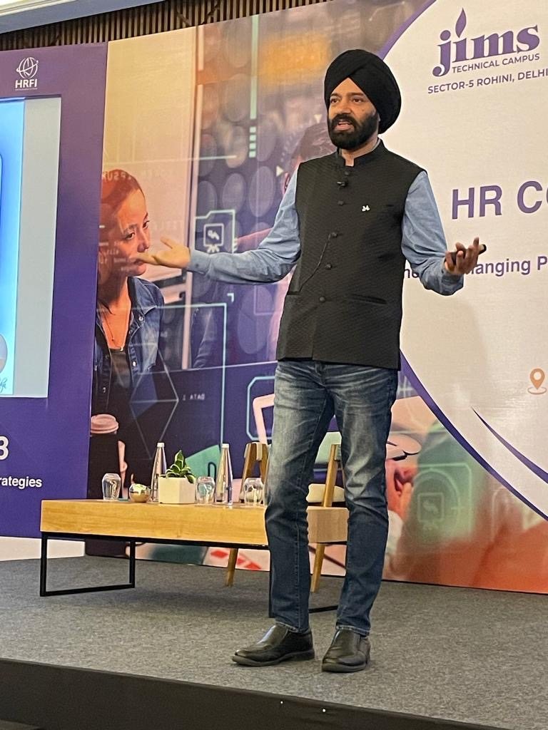 Harjeet speaking at an HR conclave