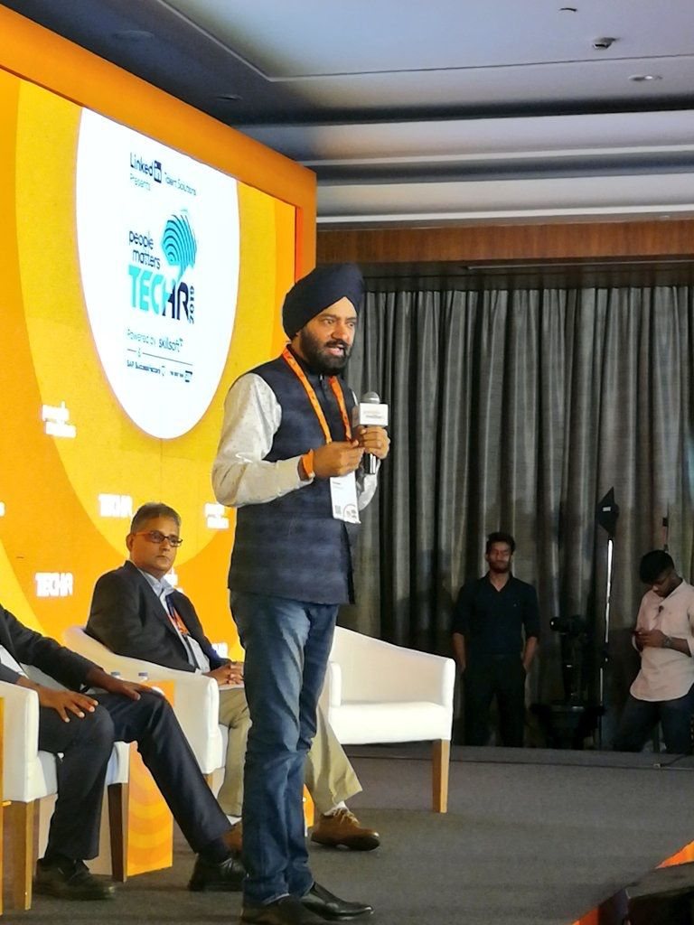 Harjeet speaking at People Matters TechHR